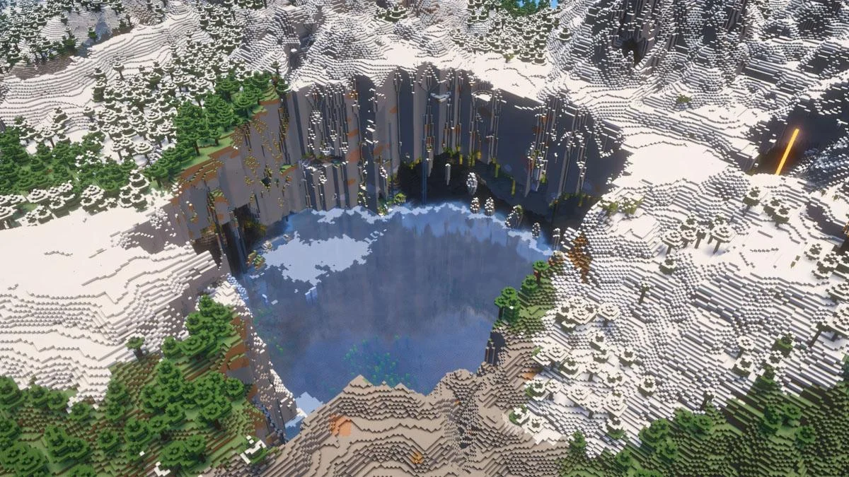 Frozen crater lake cạnh lush cave và vách đá phủ tuyết